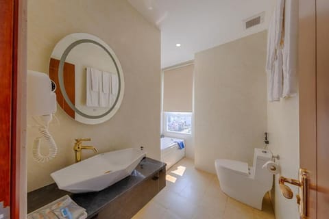 Family Triple Room, Balcony | Bathroom | Separate tub and shower, free toiletries, hair dryer, slippers