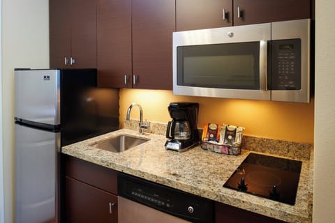 Studio, 1 King Bed with Sofa bed, Non Smoking | Private kitchen | Full-size fridge, microwave, oven, stovetop