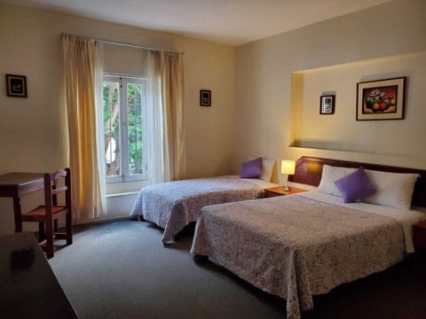 Twin Room | In-room safe, iron/ironing board, free cribs/infant beds, free WiFi
