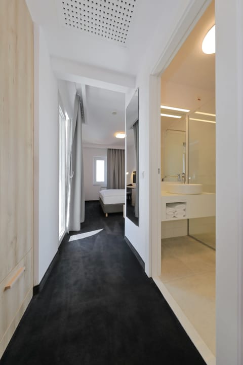 Premium Double Room, Balcony | Minibar, desk, iron/ironing board, free WiFi