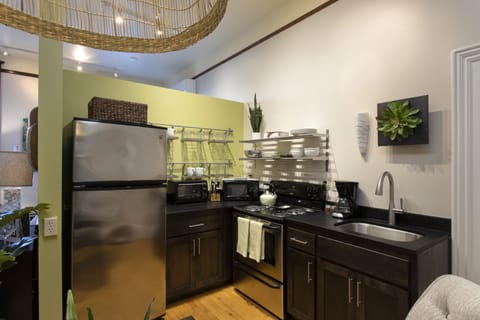 Deluxe Studio Suite, 1 King Bed, Non Smoking (3RD) | Private kitchen | Fridge, microwave, oven, stovetop