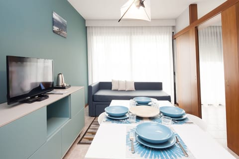 Panoramic Apartment, 1 Bedroom | Living area | Flat-screen TV