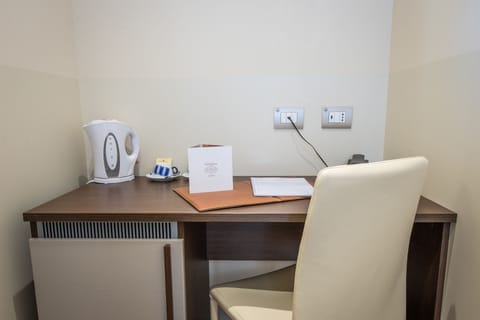 Basic Room, Patio, Ground Floor | Hypo-allergenic bedding, down comforters, minibar, in-room safe