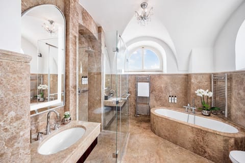 Presidential Suite, 1 King Bed | Bathroom | Combined shower/tub, deep soaking tub, designer toiletries, hair dryer