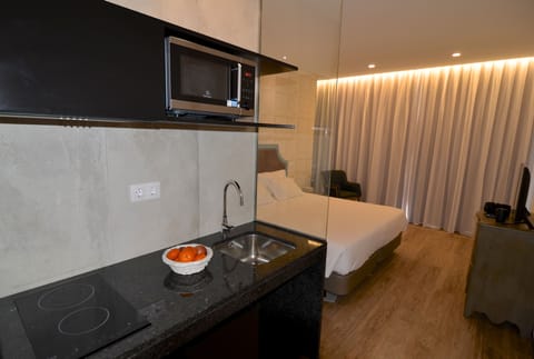 Premium Studio, Balcony, Sea View | Private kitchen | Fridge, microwave, stovetop, coffee/tea maker