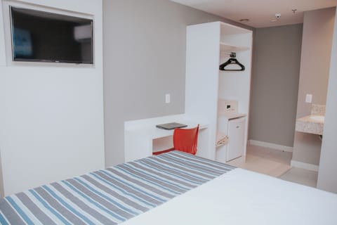 Standard Double Room | Minibar, in-room safe, desk, laptop workspace