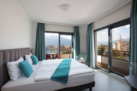 Panoramic Double Room, Balcony, Lake View | In-room safe, desk, free WiFi, bed sheets