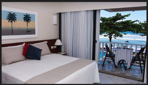 Deluxe Room, Sea View | Minibar, in-room safe, blackout drapes, WiFi