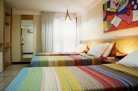 Standard Room | Minibar, in-room safe, cribs/infant beds, rollaway beds