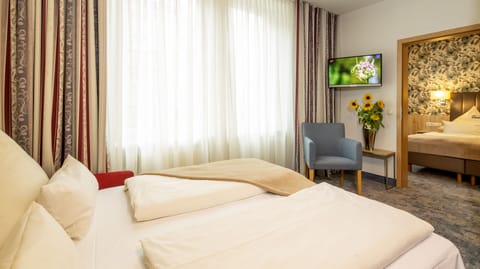 Suite | Premium bedding, minibar, in-room safe, desk