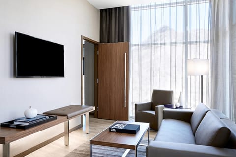 Suite, 1 Bedroom, Balcony, Corner | Living area | 32-inch Smart TV with premium channels, TV, Netflix