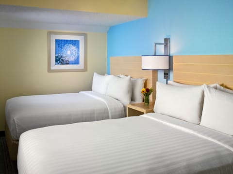 Studio Suite, 2 Queen Beds, Fireplace | Pillowtop beds, in-room safe, blackout drapes, iron/ironing board