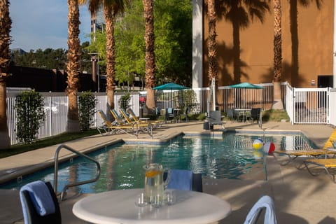 Outdoor pool, open 7:00 AM to 10:00 PM, sun loungers