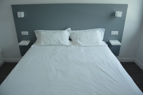 Premium bedding, desk, free WiFi, bed sheets