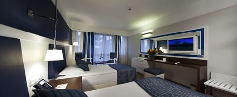 Basic Double or Twin Room | Minibar, in-room safe, free WiFi, bed sheets