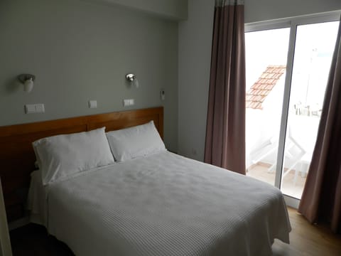 Double Room, Balcony, Partial Sea View | In-room safe, desk, blackout drapes, iron/ironing board