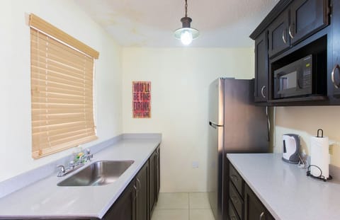 Superior Apartment, 1 Bedroom, Kitchen, Executive Level | Private kitchen | Full-size fridge, microwave, oven, stovetop