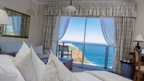 Deluxe Room, 1 King Bed, Sea View | In-room safe, individually decorated, individually furnished, desk