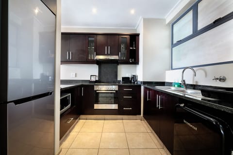 Deluxe Apartment, 2 Bedrooms, Harbor View, Beachfront | Private kitchen | Full-size fridge, microwave, oven, stovetop