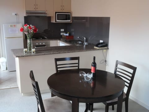 Standard Apartment, 1 Bedroom | Private kitchen | Microwave, coffee/tea maker, electric kettle