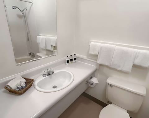 Room, 2 Queen Beds | Bathroom | Combined shower/tub, free toiletries, hair dryer, towels