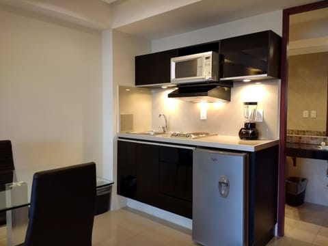 Fridge, microwave, coffee/tea maker, toaster