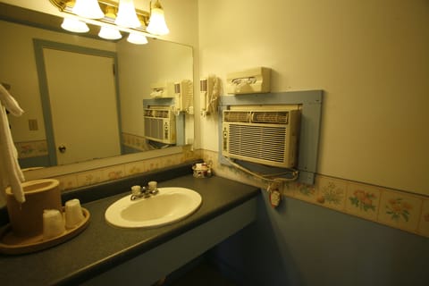 Room, 2 Double Beds, Non Smoking | Bathroom | Combined shower/tub, free toiletries, hair dryer, towels