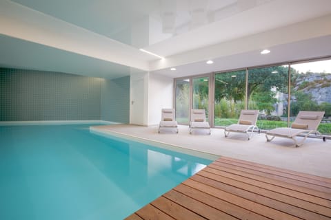 Indoor pool, open 8:00 AM to 9:00 PM, sun loungers