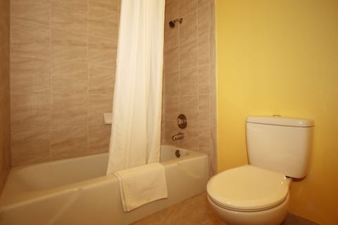 Standard Room, 2 Queen Beds | Deep soaking bathtub