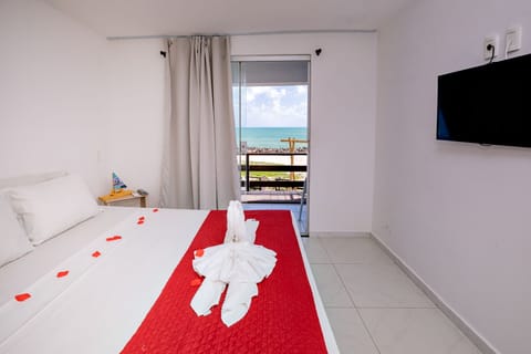 Twin Room, Ocean View | Minibar, in-room safe, blackout drapes, free WiFi