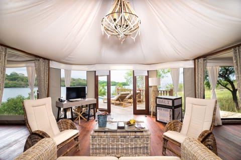 Two Bedroom Cliff Tent Villa | Minibar, in-room safe, desk, laptop workspace