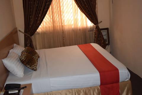 Classic Room | Premium bedding, blackout drapes, free WiFi