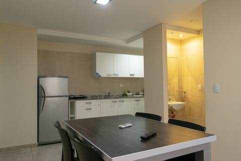 Apartment, 1 Bedroom | Living area | 32-inch LED TV with cable channels, TV, pay movies