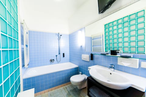 Suite, 1 Bedroom | Bathroom | Free toiletries, hair dryer, bathrobes, slippers