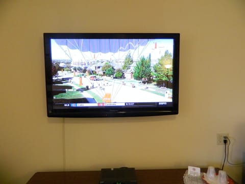 50-inch flat-screen TV with cable channels, TV