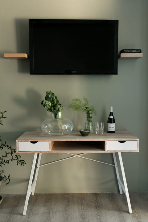 32-inch flat-screen TV with satellite channels, TV