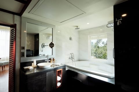 Suite | Bathroom | Designer toiletries, hair dryer, bathrobes, slippers