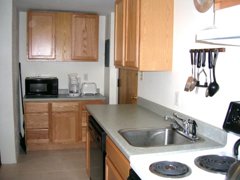 Traditional Suite, 1 Bedroom | Private kitchen | Fridge, microwave, oven, stovetop