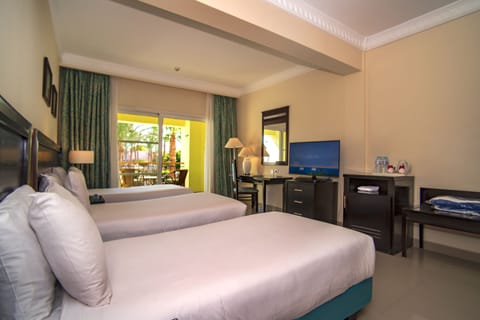 Standard Room, 3 Twin Beds, Garden View | Minibar, in-room safe, desk, iron/ironing board
