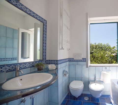 Triple Room, Balcony, Sea View | Bathroom | Shower, rainfall showerhead, free toiletries, hair dryer