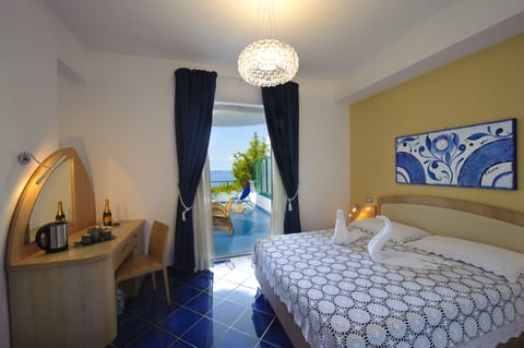 Deluxe Double Room, Terrace, Sea View | Premium bedding, minibar, in-room safe, desk