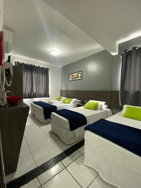 Family Room | Minibar, blackout drapes, iron/ironing board, free WiFi