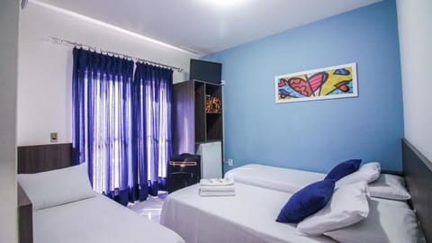 Standard Room | Minibar, blackout drapes, iron/ironing board, free WiFi