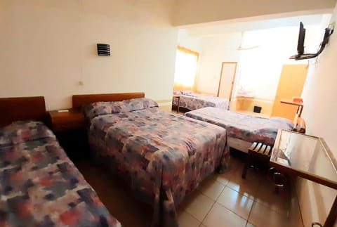 Standard Room, 2 Double Beds | Iron/ironing board, free WiFi, bed sheets