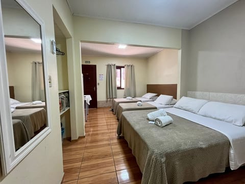 Quadruple Room | Minibar, blackout drapes, iron/ironing board, free WiFi