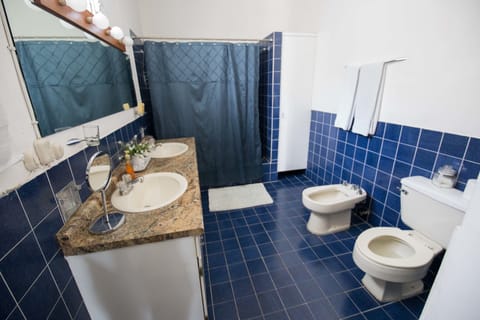 Executive Suite, 1 King Bed, Patio | Bathroom | Shower, free toiletries, towels