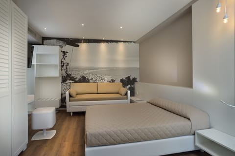 Superior Quadruple Room, Accessible, Balcony | In-room safe, desk, soundproofing, free WiFi