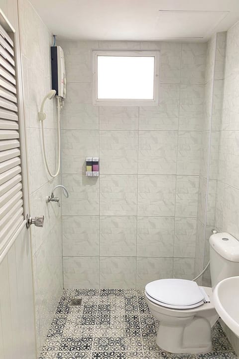 Standard Room with AirCon | Bathroom | Shower, free toiletries, hair dryer, towels