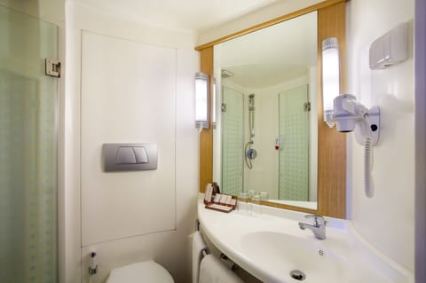 Shower, eco-friendly toiletries, hair dryer, slippers