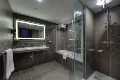 Suite, 1 Queen Bed | Bathroom | Shower, rainfall showerhead, hair dryer, bathrobes